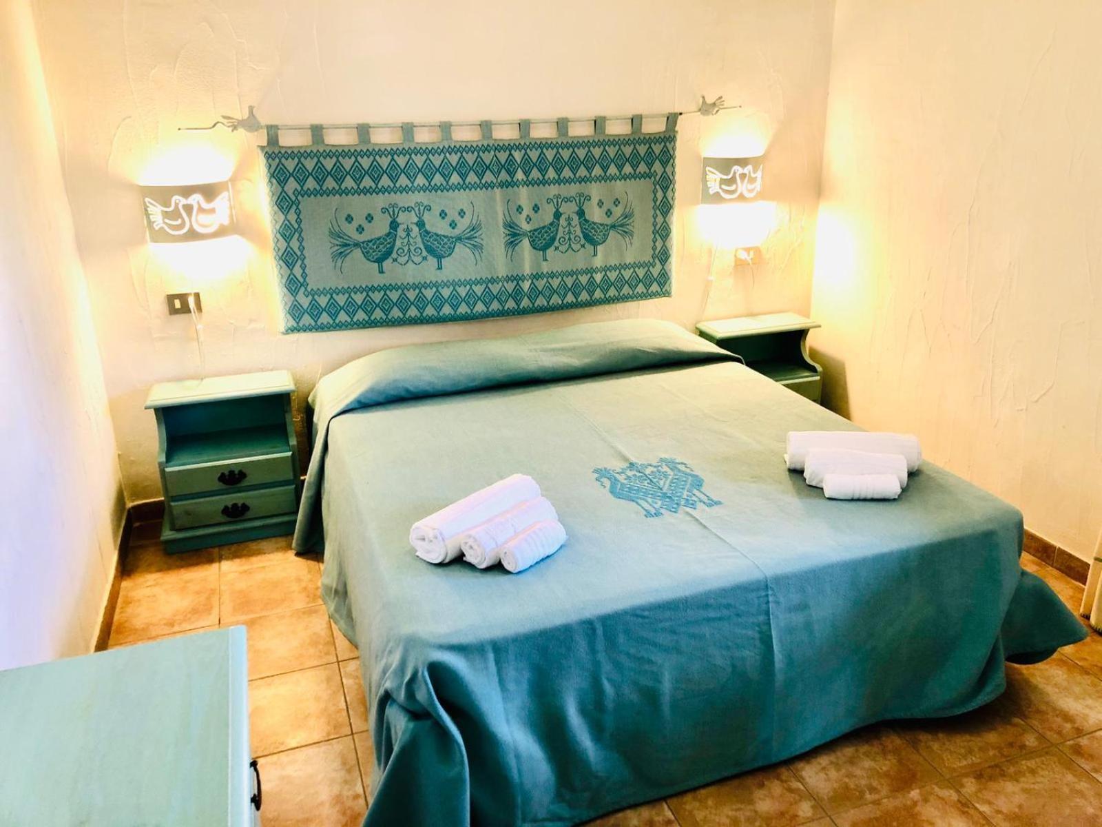 Le Corti Di Marinella Aparthotel Маринела Стая снимка